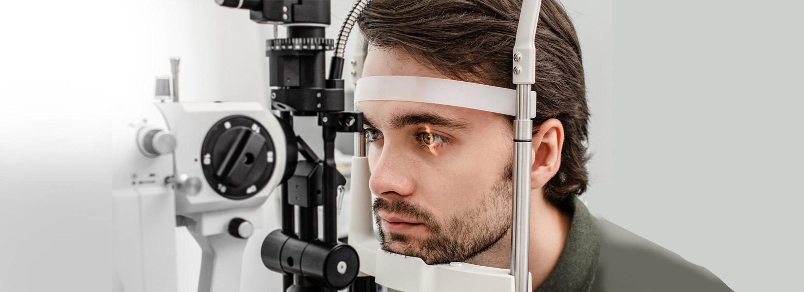 young man during eye exam in Central Northwest